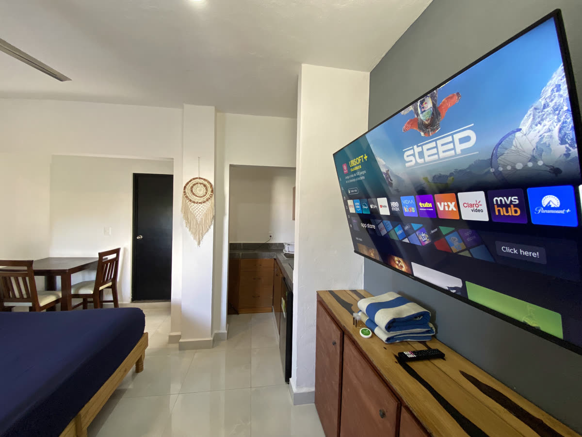 Private suite with king bed at Maui Hostels Playa del Carmen